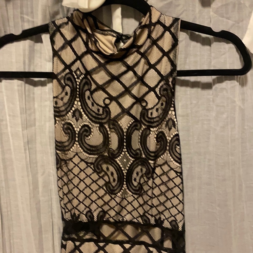 Lace/back tie up cocktail dress.